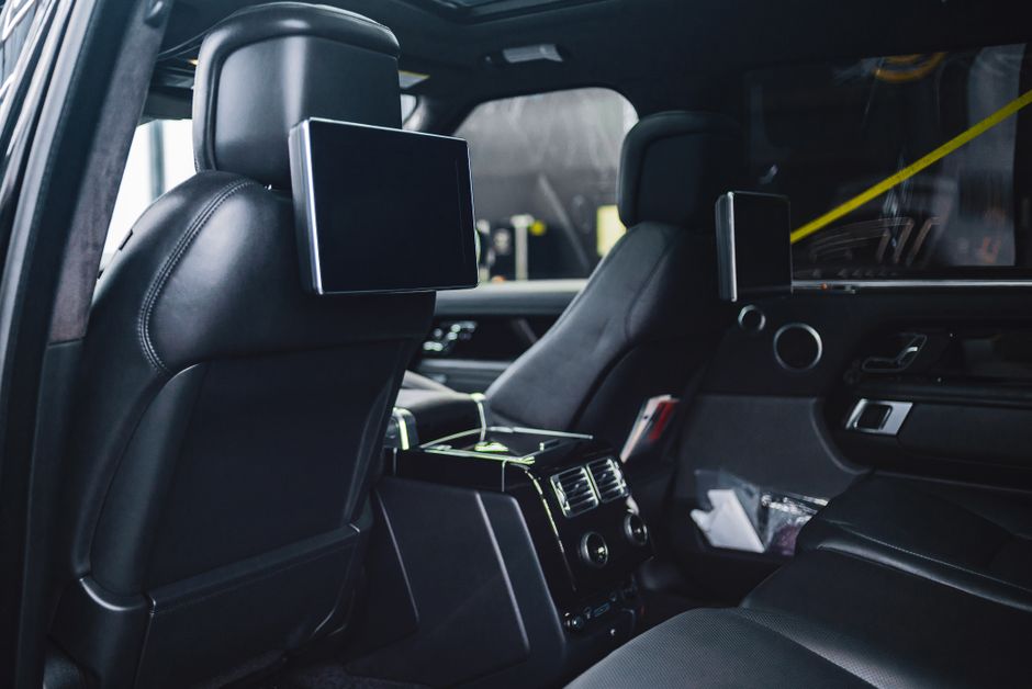 Genesis GV90 Turns Its Cabin Into a Private Cinema With a Retractable 24.6-Inch Screen