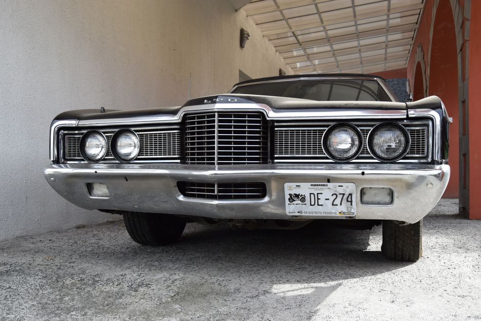 Parked Palace: A 1966 Ford LTD Emerges from a Barn