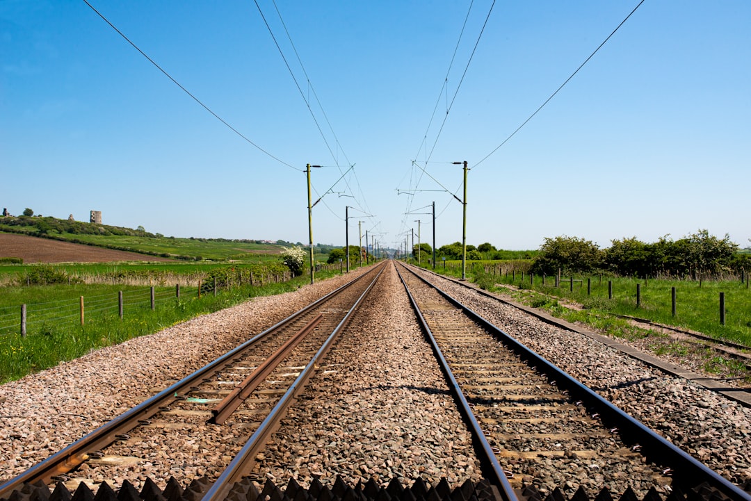 Turning Railway Fiber Optics into a Real-Time Safety Sensor