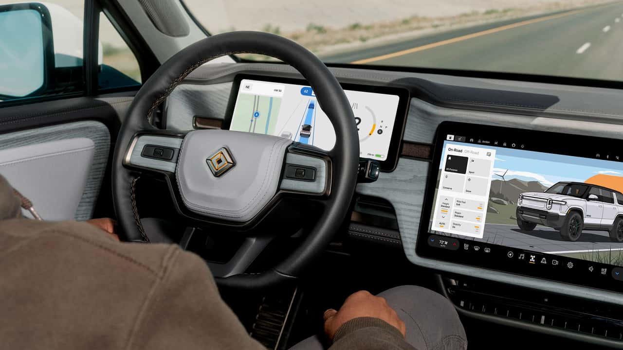 Rivian Hands VW Its AI Voice Assistant as $5.8B Tech Alliance Deepens