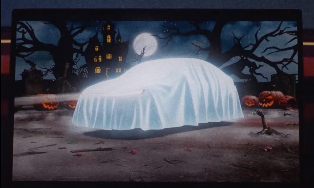 Tesla Teases Halloween Mode Update Featuring Optimus Emerging from a Graveyard