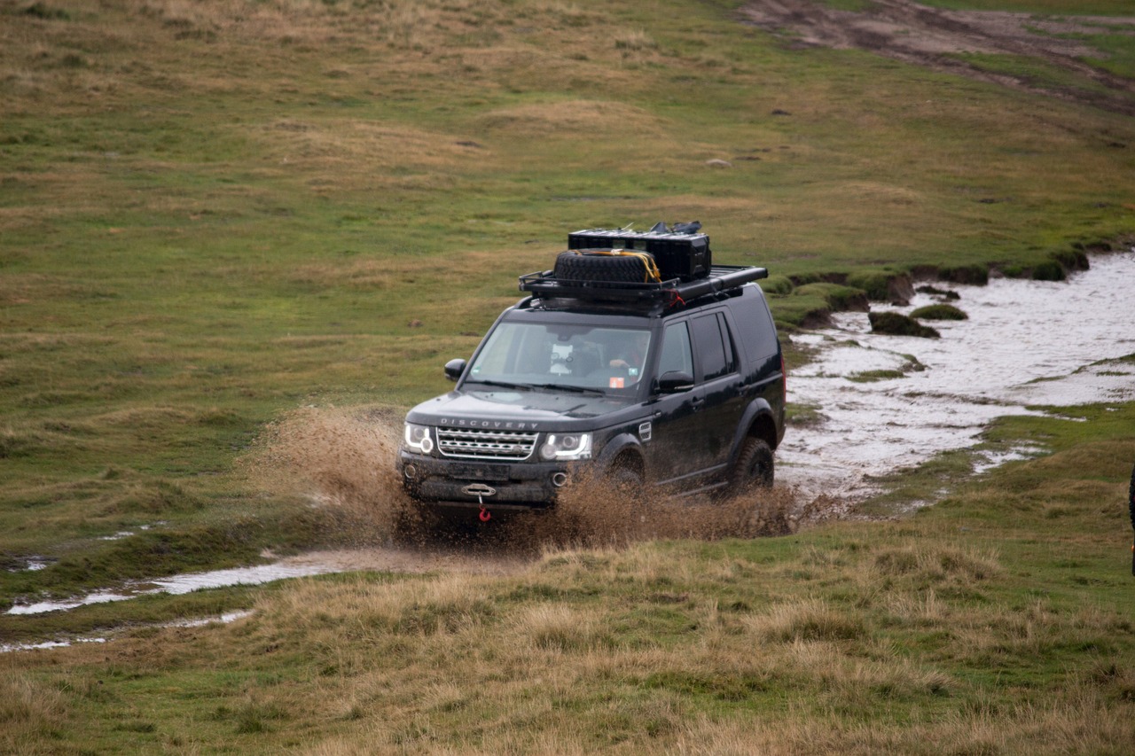 JLR's Defender Defense Division Debuts with Wolf Series II, Challenging Military Vehicle Norms